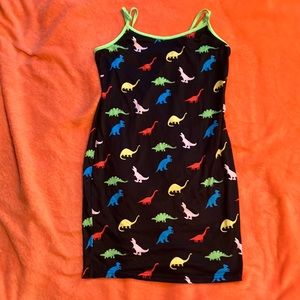 That’s is a dinosaur dress,colors enclude:purple,black,yellow,blue,red and green